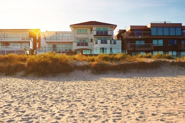 Beautiful Florida beach houses with the beach in the foreground