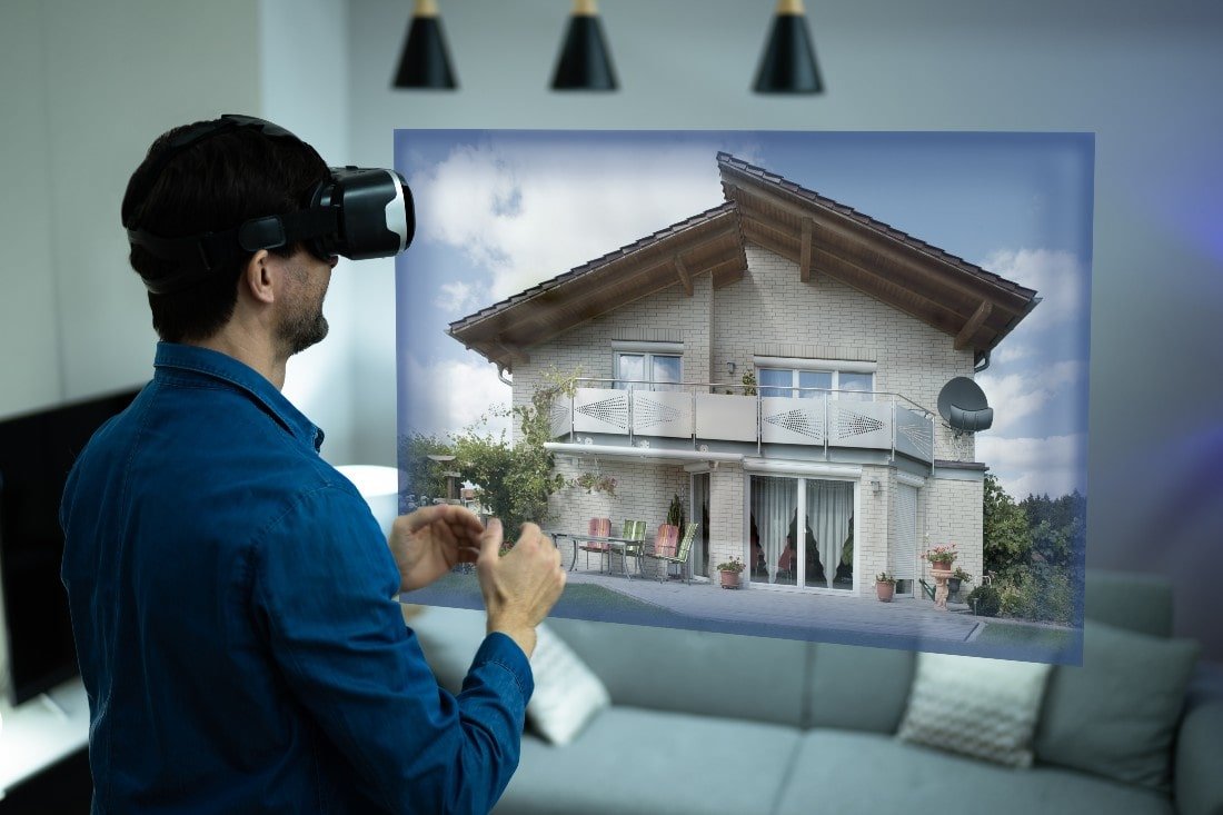 Man wearing virtual reality glasses for a virtual home tour