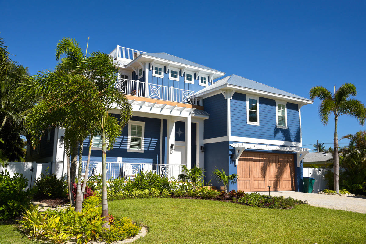 A fantastic, blue Floridian home during the summer time