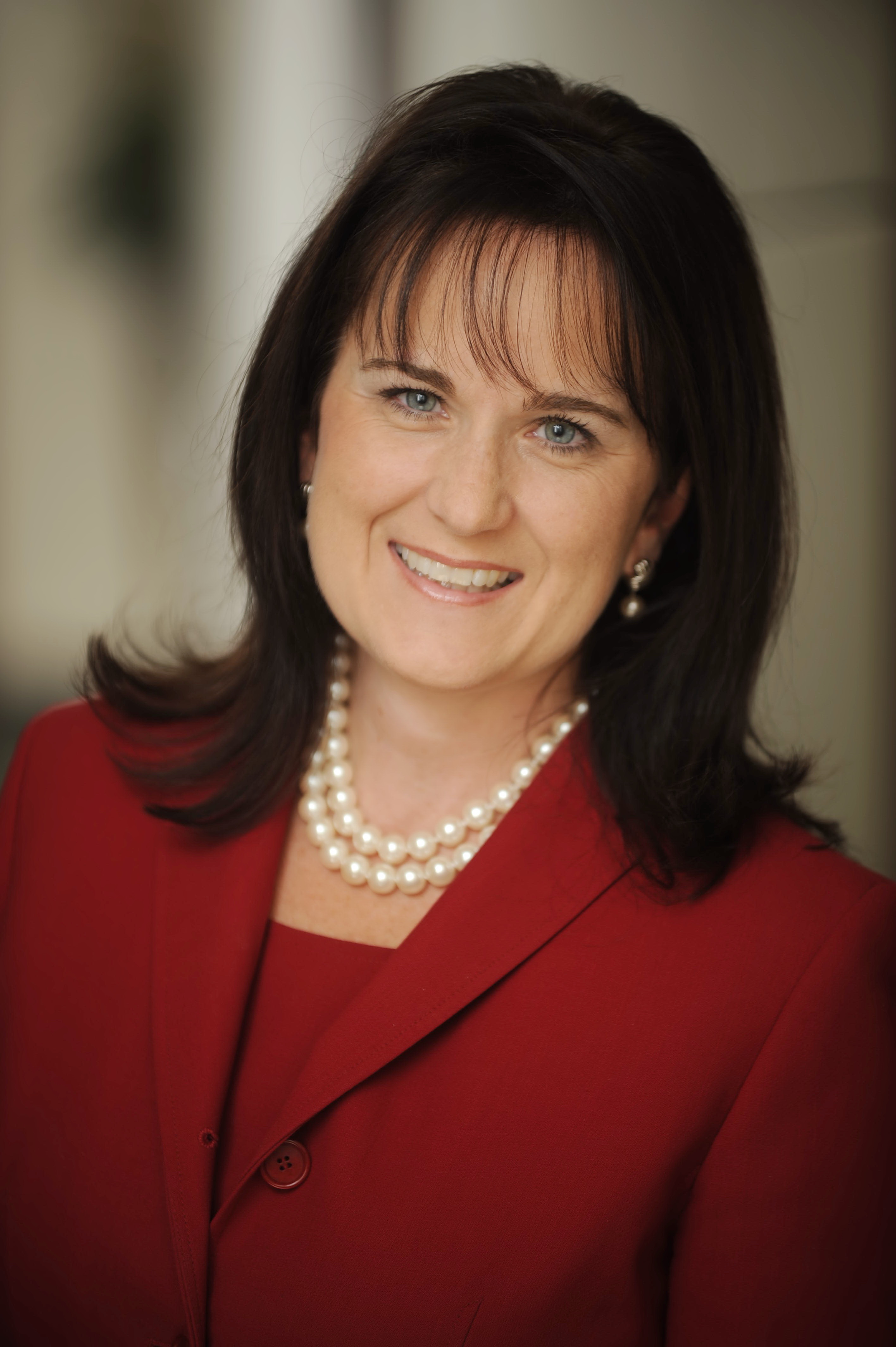 Portrait of Kimberly Suedmeyer, Top Sales Volume | REALTOR® | Broker Associate.